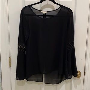 Sheer black flowy top